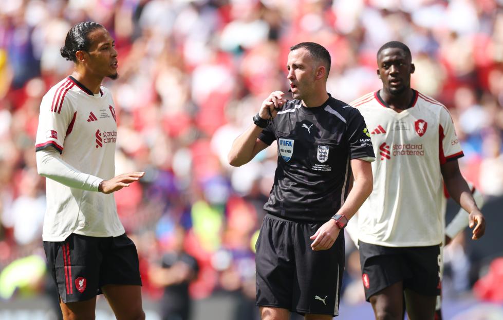 Virgil van Dijk of Liverpool appeals to a referee.