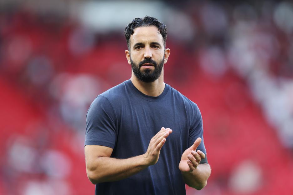 Ruben Amorim, Manchester United manager, applauding fans.
