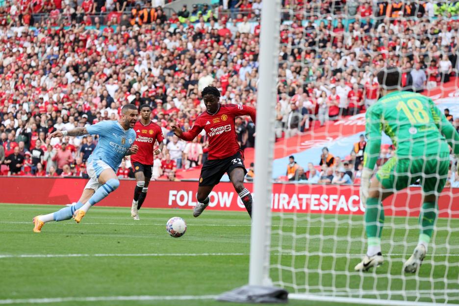 Kobbie Mainoo of Manchester United scoring a goal during the Emirates FA Cup final.
