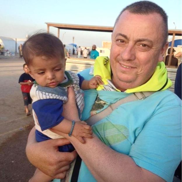 Family handout photo of Alan Henning's daughter with a baby.