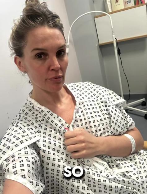 Woman in hospital gown.