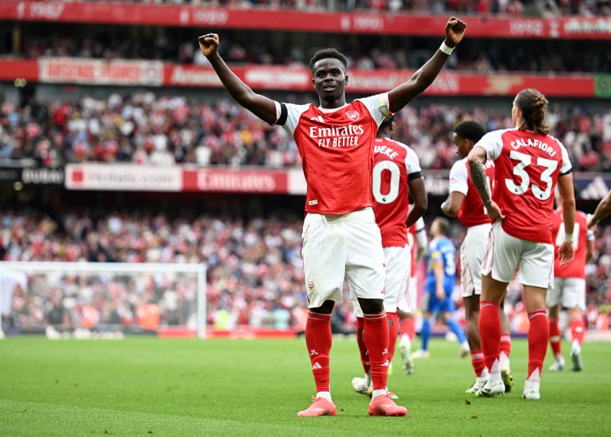 Bukayo Saka of Arsenal celebrating a goal.