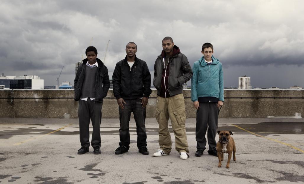 Cast of Top Boy on a rooftop.