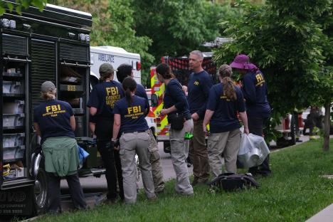 FBI evidence response team members at a crime scene.