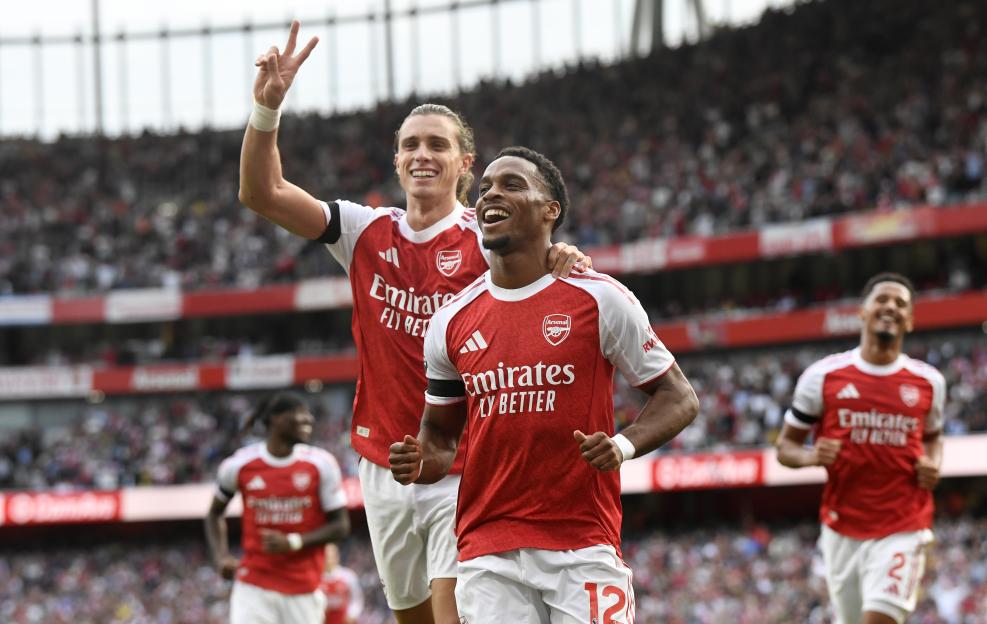 Arsenal players celebrating a goal.