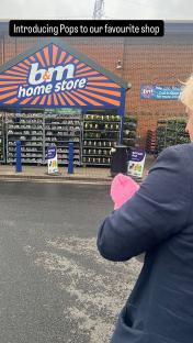 Boris Johnson at a B&M Home Store with Carrie Johnson and their daughter.