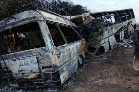 At least 40 killed as two buses crash and burst into flames – leaving terrified passengers trapped inside vehicles