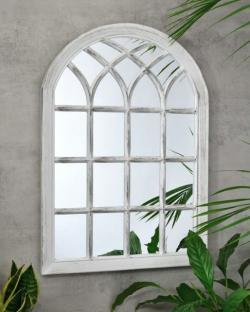 White arched windowpane mirror.
