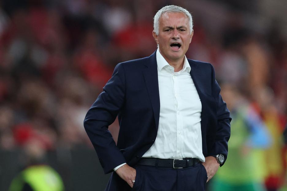Benfica's Portuguese coach Jose Mourinho reacting during a football match.
