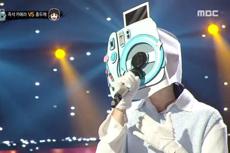 Watch: Popular Rookie Boy Group Member Shows Off His Vocals On “The King Of Mask Singer”