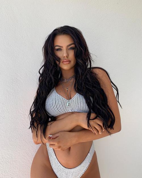 Woman in a gray and white ribbed bikini.