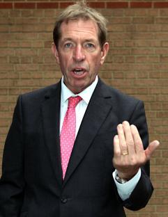 Derek Thompson, horse racing pundit, speaking outside a William Hill shop.