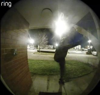 Ring doorbell camera footage of a suspect at night.
