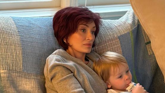Sharon Osbourne called out for ‘extreme filter’ on face in new photo with grandson – as fans say feet ‘give it away’