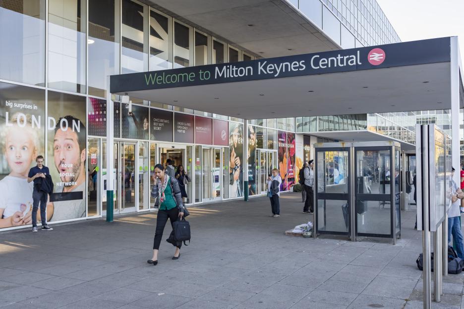 Horror as gunman is shot dead by cops at train station in broad daylight