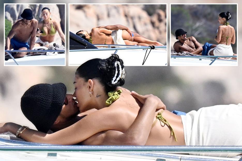 Jude Bellingham and bikini-clad girlfriend Ashlyn Castro can’t keep hands off each other as they kiss on superyacht