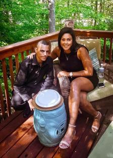 Danny and Tarra Clark, sisters, sitting on a deck.