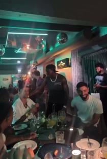 Bruno Fernandes and Joao Cancelo at a dinner.