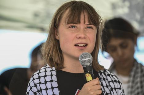 CATANIA, ITALY - JUNE 01: Greta Thunberg speaking at the press conference. Greta is part of the crew of the ship Madleen, headed to Gaza to deliver humanitarian aid on June 01, 2025 in Catania, Italy. Swedish activist Greta Thunberg is among those who will attempt to sail to Gaza on a boat organized by the Freedom Flotilla Coalition (FFC), in a bid to break Israel's blockade of the Palestinian territory. Freedom Flotilla had to abort a previous journey in early May after it said its boat came under attack by drones in international waters near Malta. (Photo by Fabrizio Villa/Getty Images)