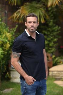 Jamie Lomas as Warren Fox in Hollyoaks.