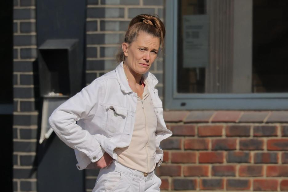 Woman who performed sex act on female pal in front of horrified children on school run avoids jail