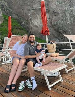 Couple on vacation with their baby.