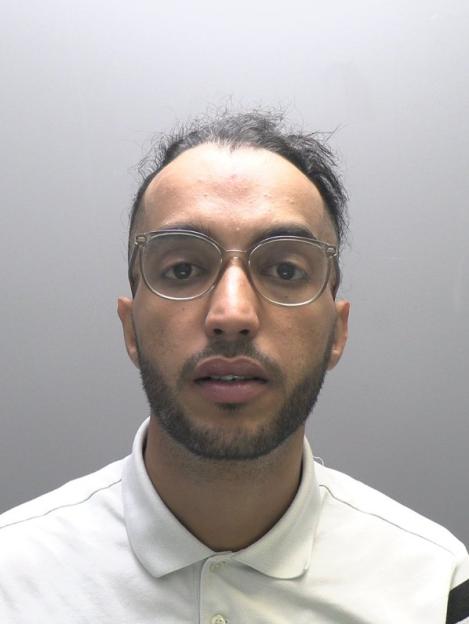 Mugshot of Adam Zawi, an asylum seeker.