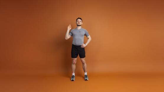 Man demonstrating a fitness exercise.