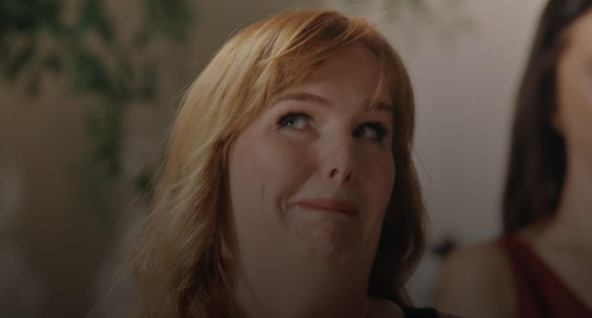 Leisha displaying a look of discomfort.