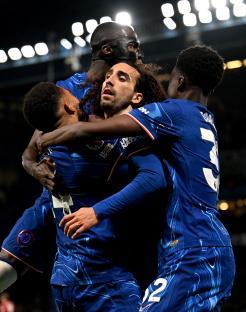 Chelsea's Marc Cucurella celebrates a goal with teammates.