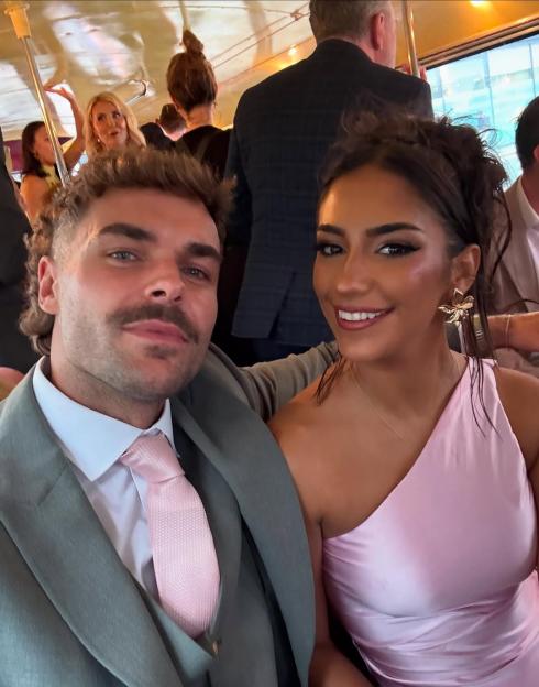 Toni, with Harry, dressed in formal attire.
