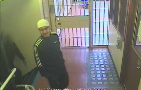 Security camera image of Hashem Abedi in an Adidas tracksuit and glasses.