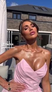 Amy Childs in a pink dress.