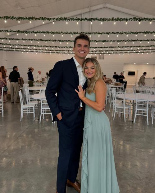 Abby and Matt Howard posing for a photo.