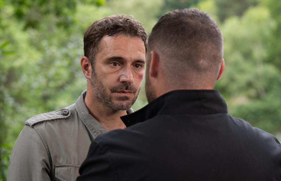 Aaron Dingle and John Sugden confronting each other in Emmerdale.
