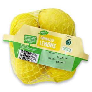 Four unwaxed lemons in a mesh bag.