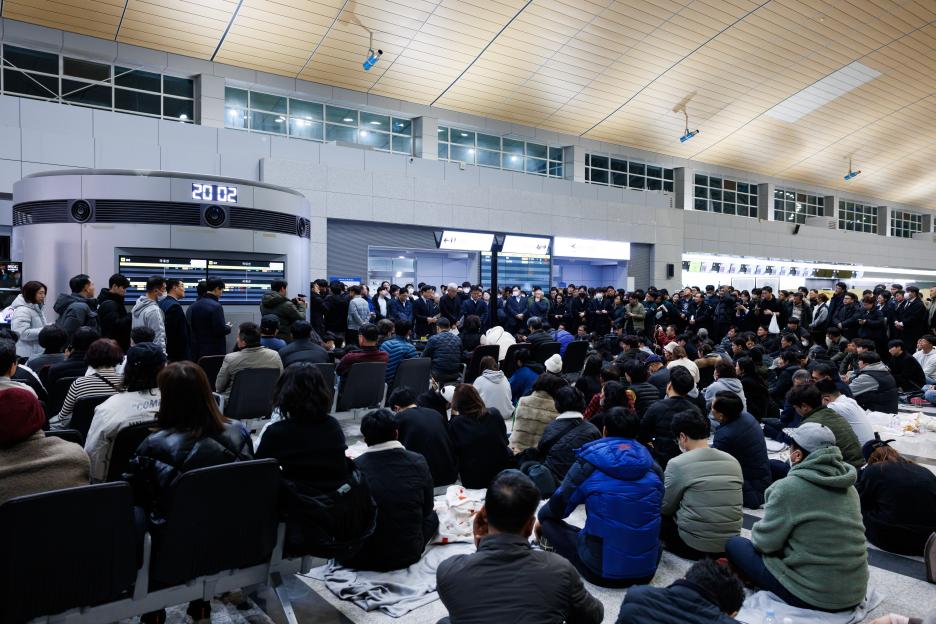 Family and relatives of victims of Jeju Air Co. Flight 2216 at Muan International Airport in Muan County, South Korea.