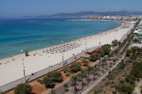 Aerial view of a crowded beach in El Arenal, Majorca.