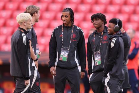 Manchester United players Leny Yoro, Alejandro Garnacho, Patrick Dorgu, and Amad Diallo at a stadium.