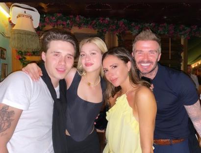 Brooklyn Beckham with his fiancée, Nicola Peltz, and his parents, David and Victoria Beckham.