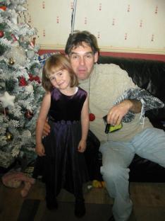 Photograph of Paul Jones and his daughter April at home in Machynlleth.