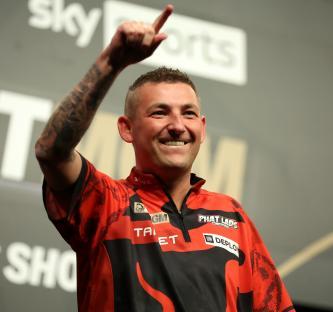 Nathan Aspinall celebrating a victory.