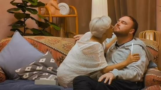 Dr. Danielle Harel and Zac embracing on a couch.