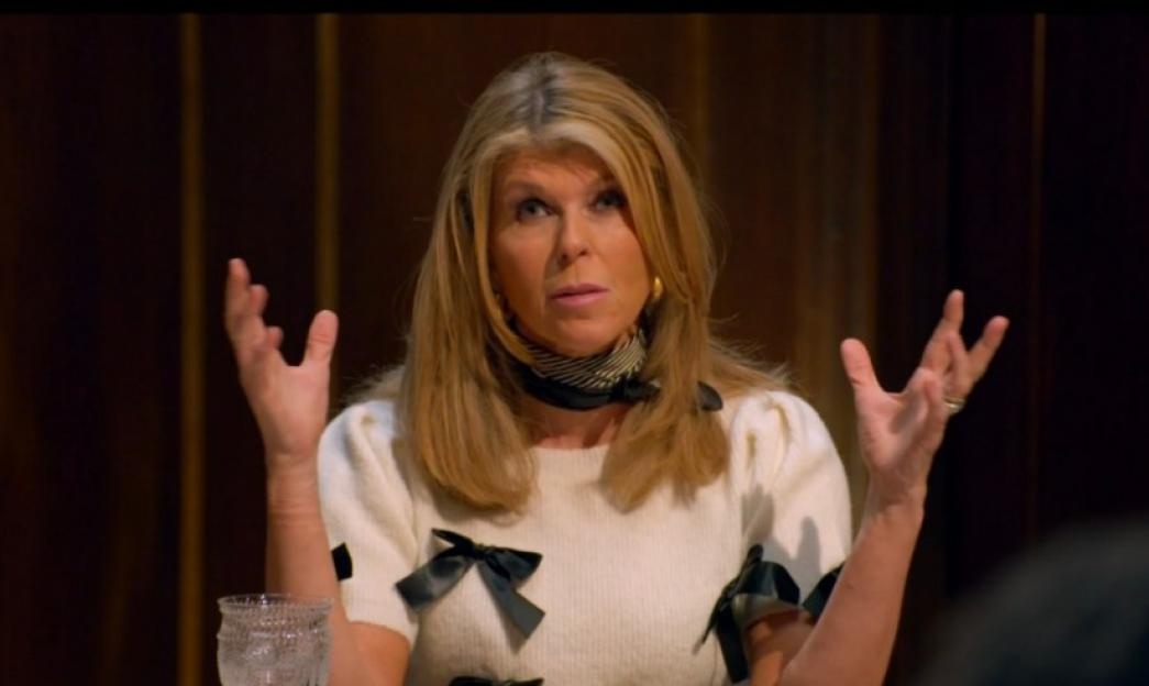 Kate Garraway with her hands raised in a discussion.