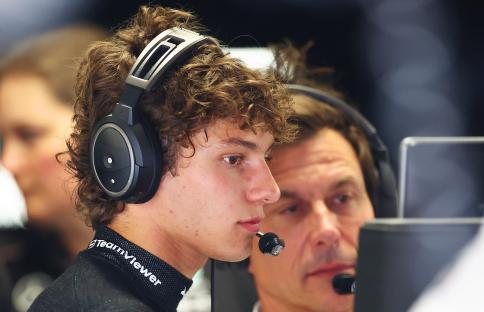 Andrea Kimi Antonelli of Italy and Mercedes wearing headphones in the garage during practice.