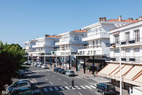 Street scene in Royan, France, showing 1950s architecture.