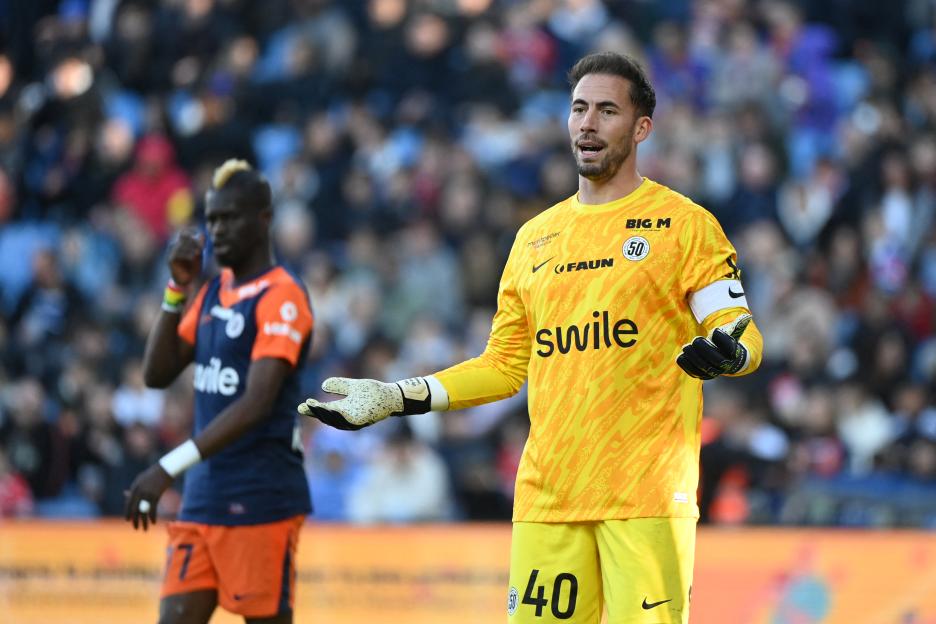 Montpellier goalkeeper Benjamin Lecomte #40 reacting during a soccer match.
