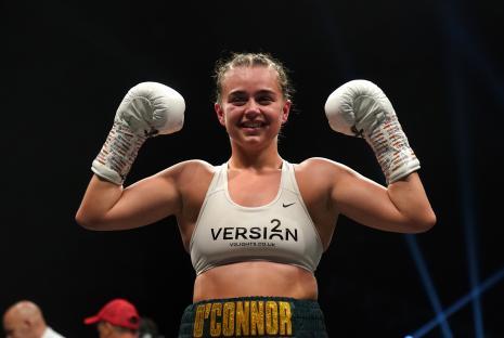 Georgia O'Connor celebrates a boxing victory.