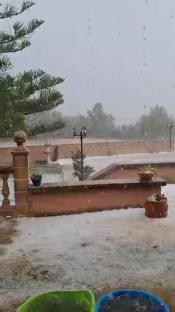 Hail covering the ground during a storm in Spain.