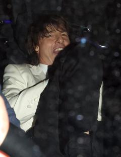 Tom Cruise leaving a restaurant in London.